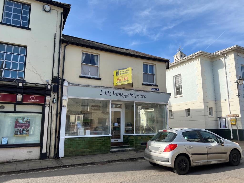 Lot: 5 - FREEHOLD TOWN CENTRE INVESTMENT - Front photo of a pair of shops in Alton Town Centre